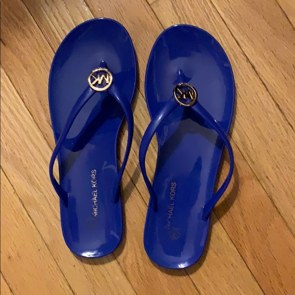 blue Michael Kors flip flops